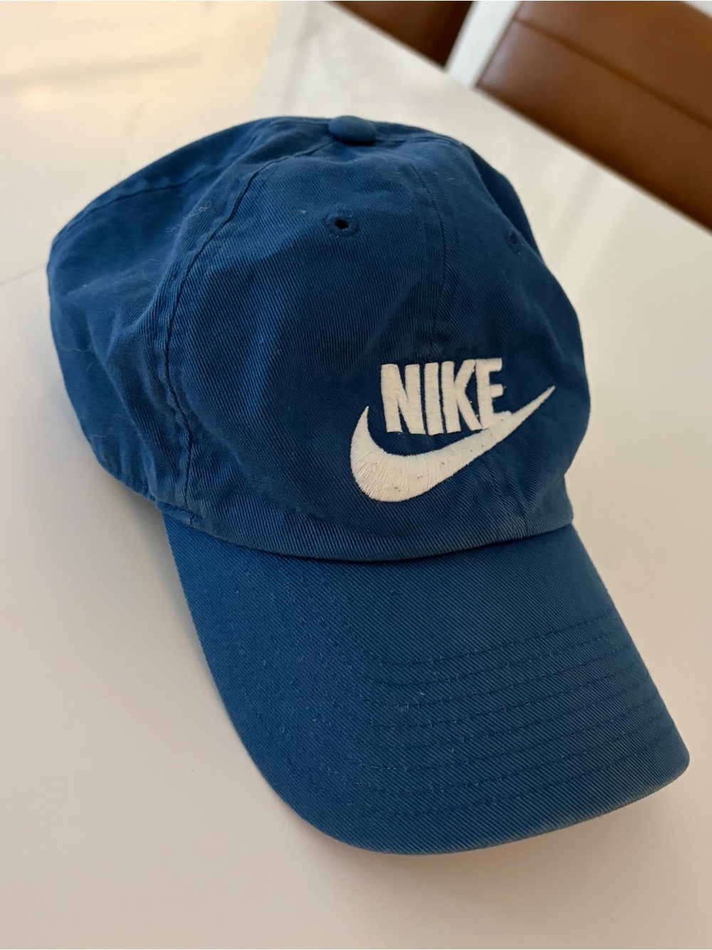 Nike Navy Cap with White Swoosh and Red Tag